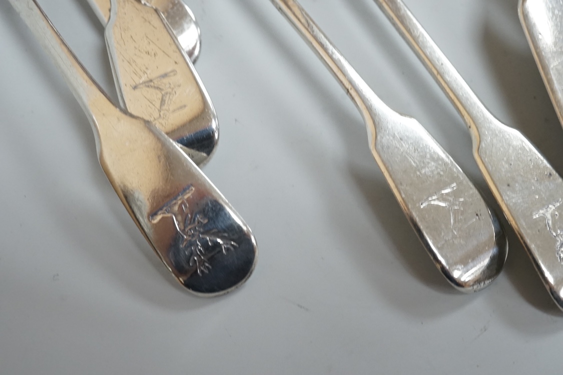 A harlequin part canteen of 19th century silver fiddle pattern flatware, comprising twenty six items, all with engraved crest various dates and makers, 32.3oz.